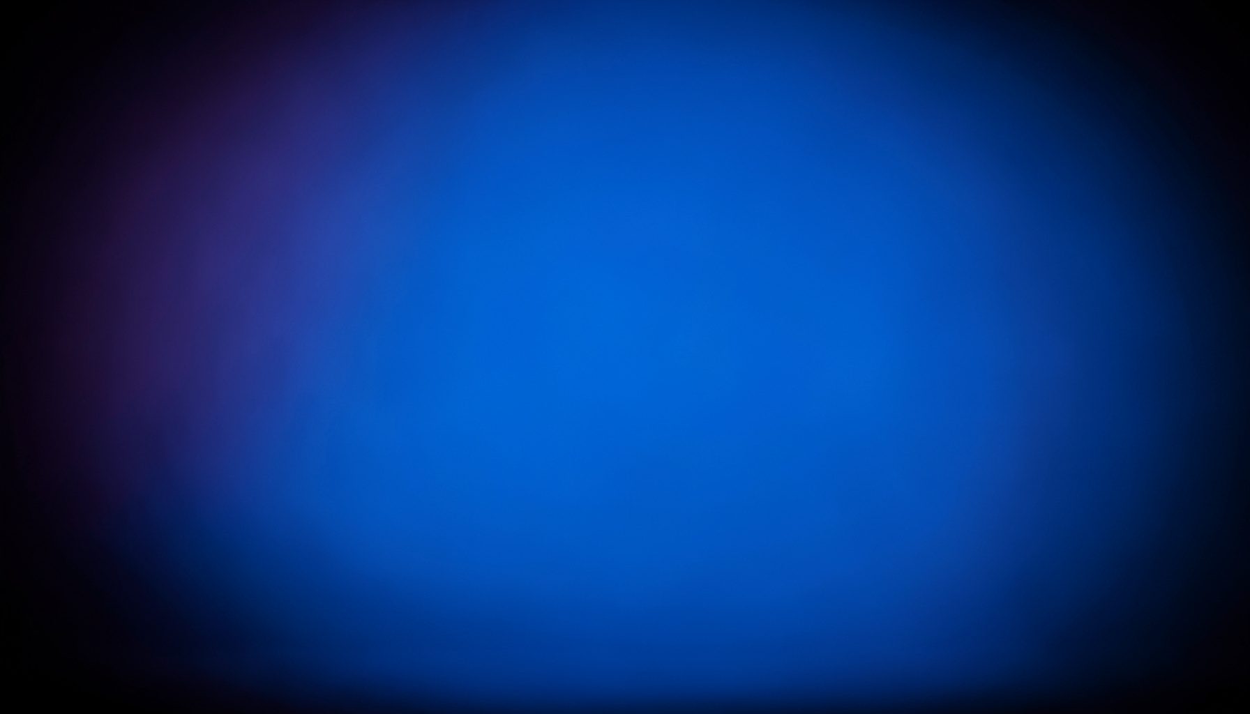 Dark atmospheric backdrop with subtle violet and indigo gradients, evoking a technical data landscape